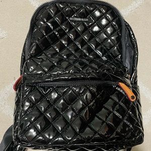 Patent leather MZ Wallace backpack.
